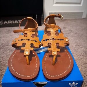Tory Burch Phoebe Leather Flat Thong
Sandal Royal Tan Brown